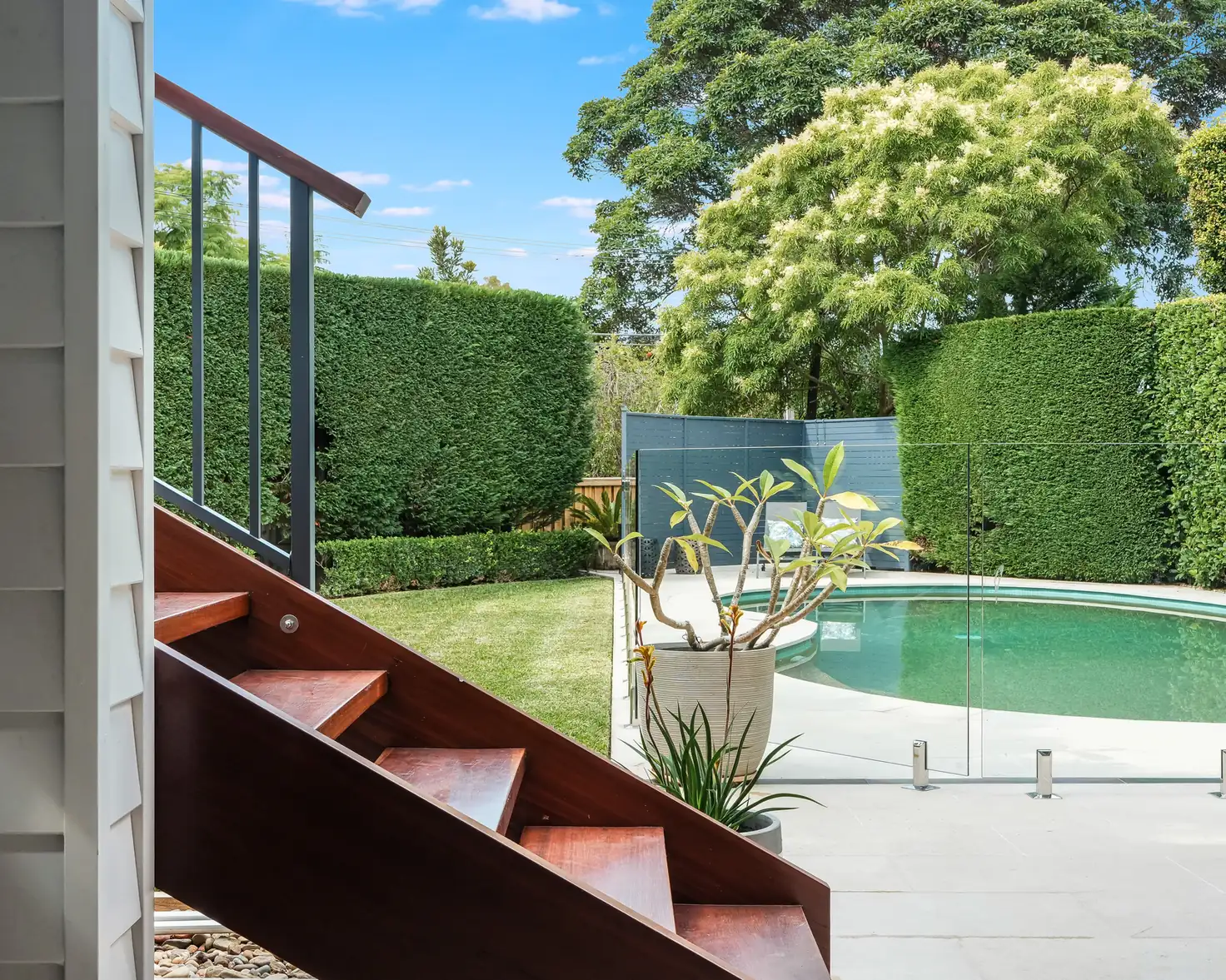 Hardwood stair from the deck down to the pool terrace, Castlecrag